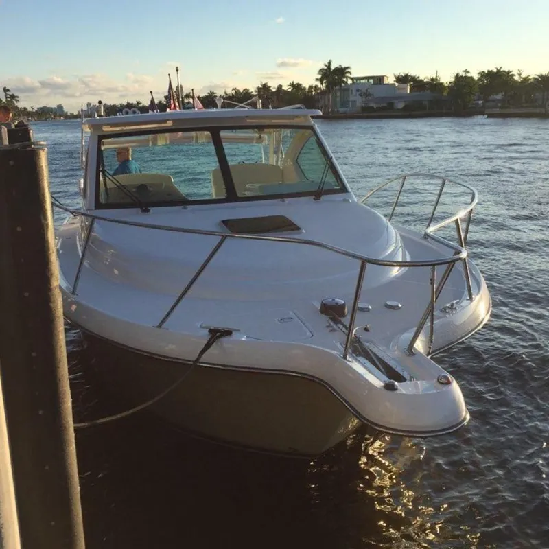 Slide: The Image of 2007 Tiara Yachts 3000 Open boat interior with white seating and deck. - 7