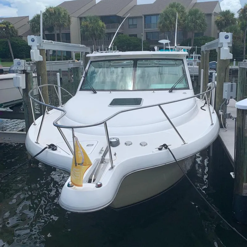 Slide: The Image of 2007 Tiara Yachts 3000 Open boat interior with white seating and deck. - 8