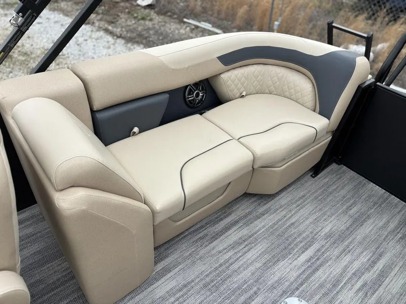 Slide: The Image of Luxurious seating on 2025 Godfrey SWEETWATER 2286 SB pontoon boat, featuring beige upholstery. - 19