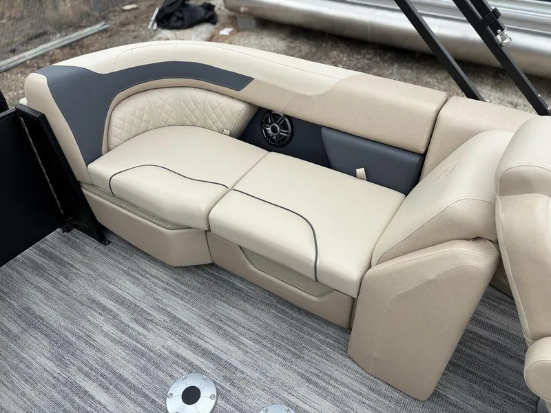 Slide: The Image of Beige seating on 2025 Godfrey SWEETWATER 2286 SB pontoon boat, featuring stylish design and speaker. - 22