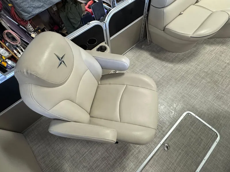 Slide: The Image of Beige captain's chair on 2020 Berkshire 22RFX boat, featuring star embroidery. - 13