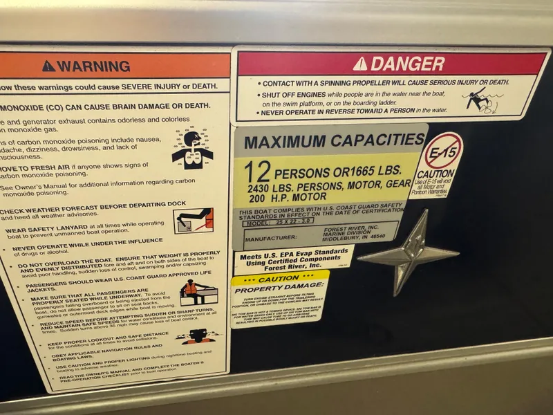 Slide: The Image of Safety and capacity warnings on a 2020 Berkshire 22RFX boat, including weight limits and danger notices. - 17