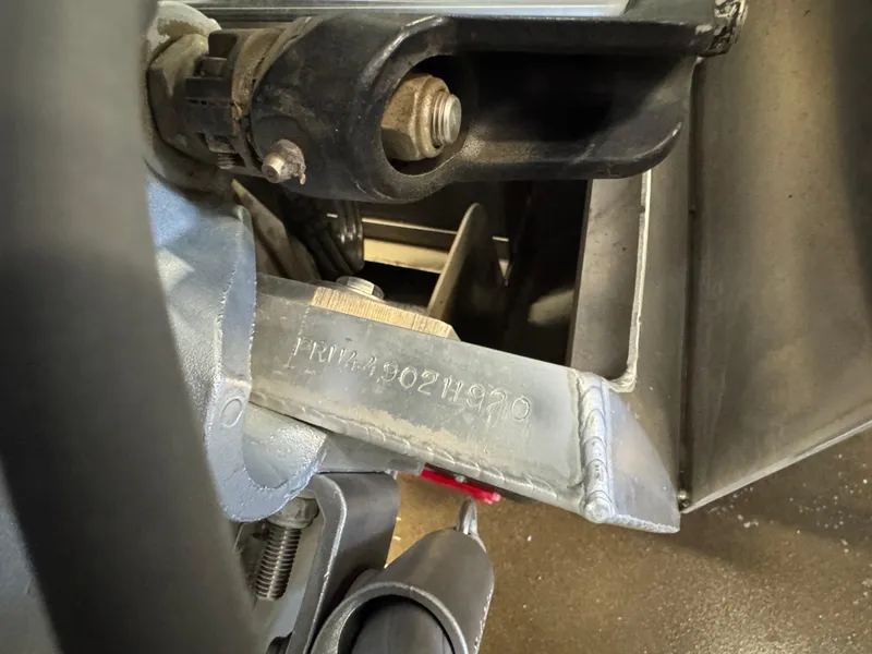 Slide: The Image of Close-up of a 2020 Berkshire 22RFX boat component, showcasing detailed mechanical parts. - 5