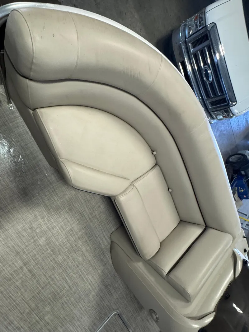 Slide: The Image of 2020 Berkshire 22RFX boat interior with beige seating and modern design. - 6