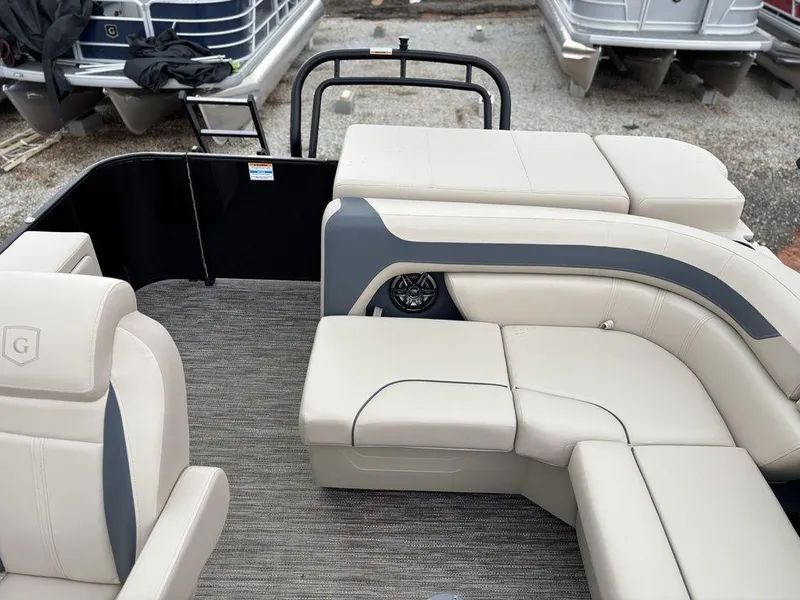 Slide: The Image of 2025 Godfrey Sweetwater 2086 C pontoon boat interior with beige seating and gray accents. - 14