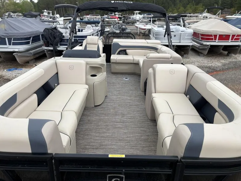 Slide: The Image of 2025 Godfrey Sweetwater 2086 C pontoon boat with spacious seating and modern design. - 7