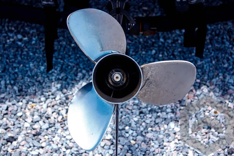 Slide: The Image of Propeller of 2014 Nitro Z Series Z-7 boat on gravel surface. - 11