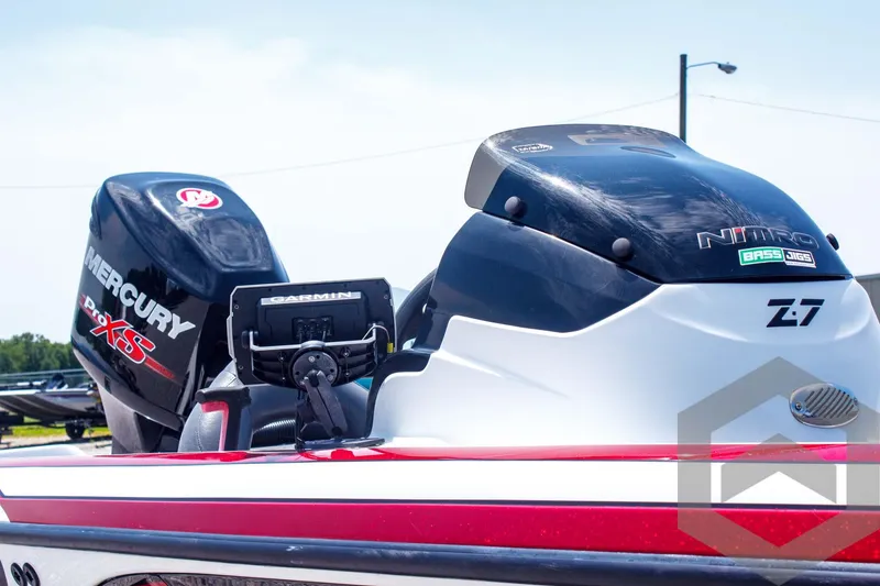 Slide: The Image of 2014 Nitro Z Series Z-7 boat with Mercury Pro XS engine and Garmin device. - 13