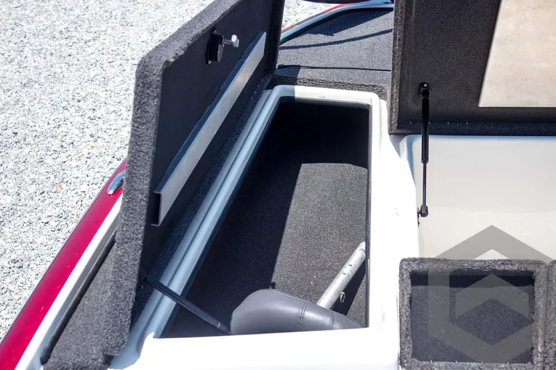 Slide: The Image of Open storage compartment in 2014 Nitro Z Series Z-7 boat. - 18