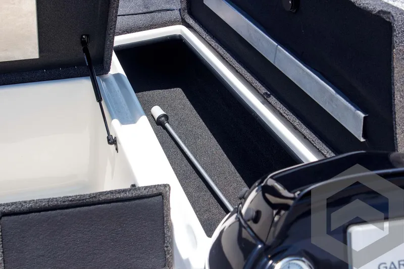 Slide: The Image of 2014 Nitro Z Series Z-7 boat storage compartment with open hatches and hydraulic lift. - 20