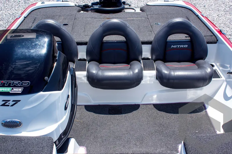 Slide: The Image of 2014 Nitro Z Series Z-7 boat interior with dual seats and motor. - 23