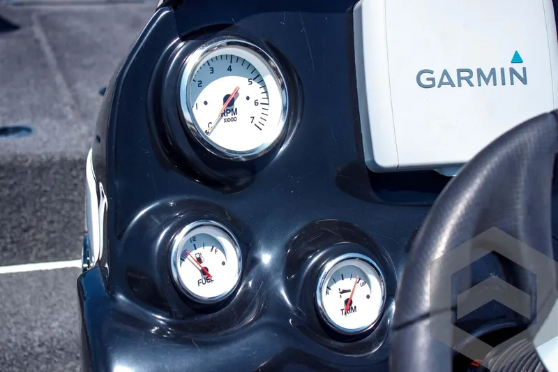 Slide: The Image of Dashboard of 2014 Nitro Z Series Z-7 boat with Garmin display and gauges. - 29