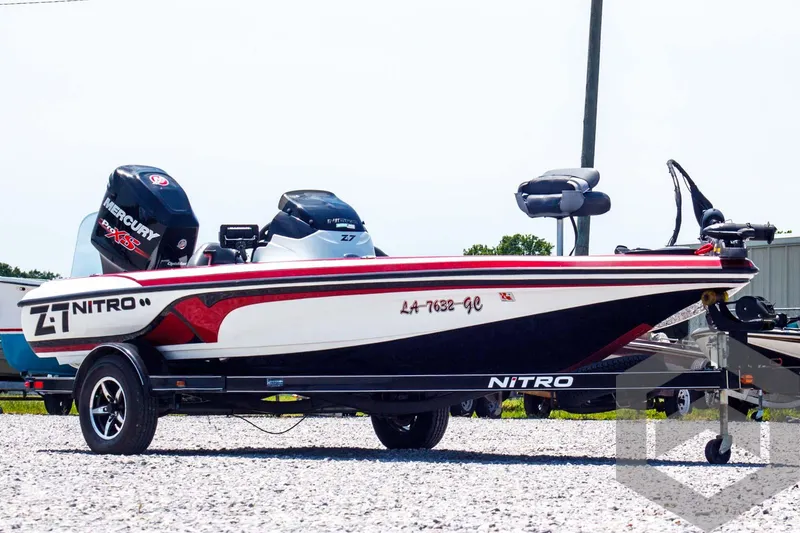 Slide: The Image of 2014 Nitro Z Series Z-7 boat with Mercury engine on a trailer. - 3