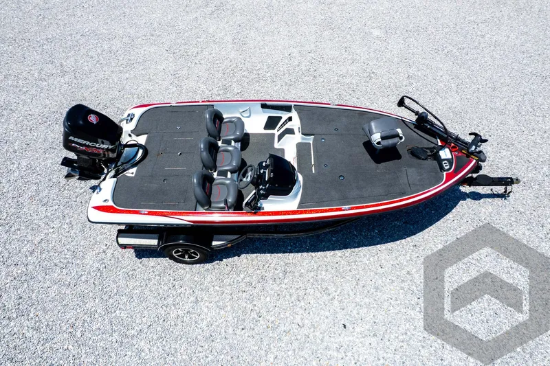 Slide: The Image of 2014 Nitro Z Series Z-7 boat, aerial view, red and black design, on gravel surface. - 41
