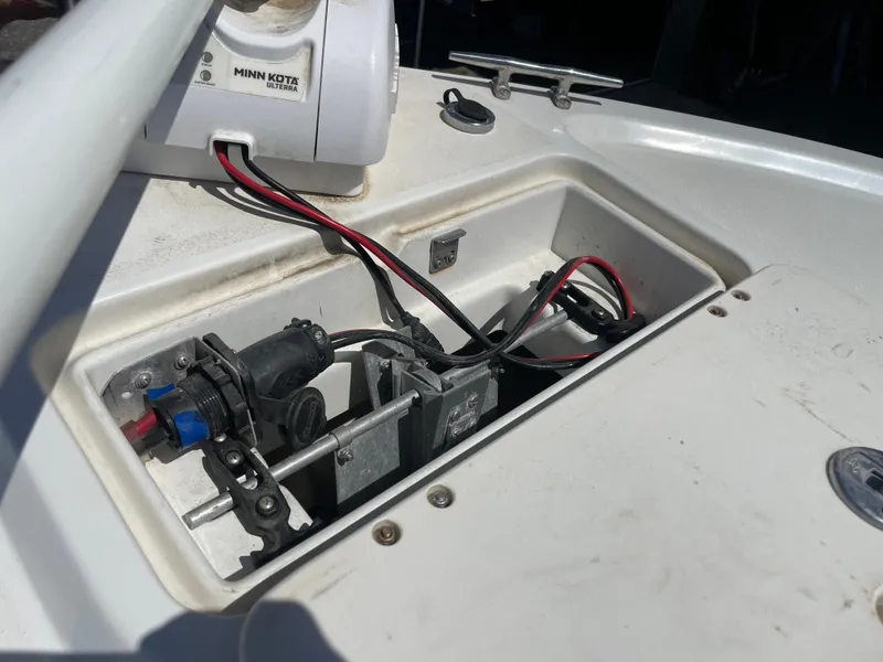 Slide: The Image of 2017 Parker 1801 CC boat wiring and motor compartment with Minn Kota components. - 12