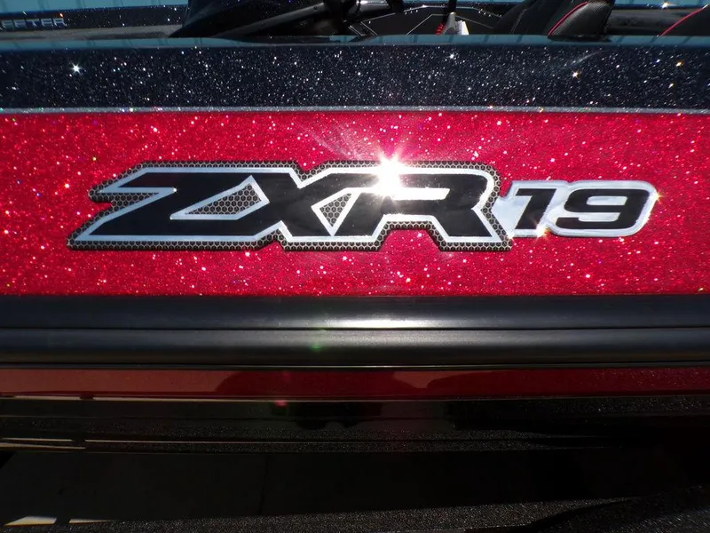 Slide: The Image of 2025 Skeeter ZXR19 logo on glittery red background. - 19