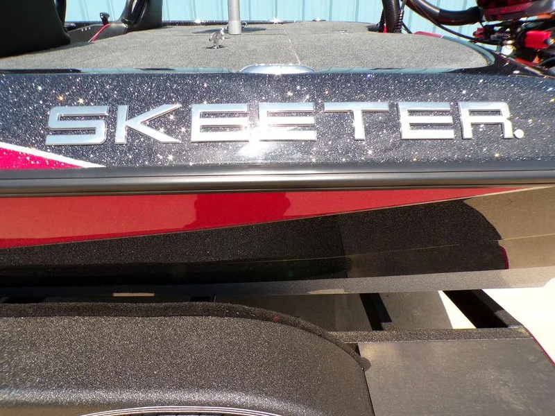 Slide: The Image of 2025 Skeeter ZXR19 boat with sleek design and metallic finish. - 20