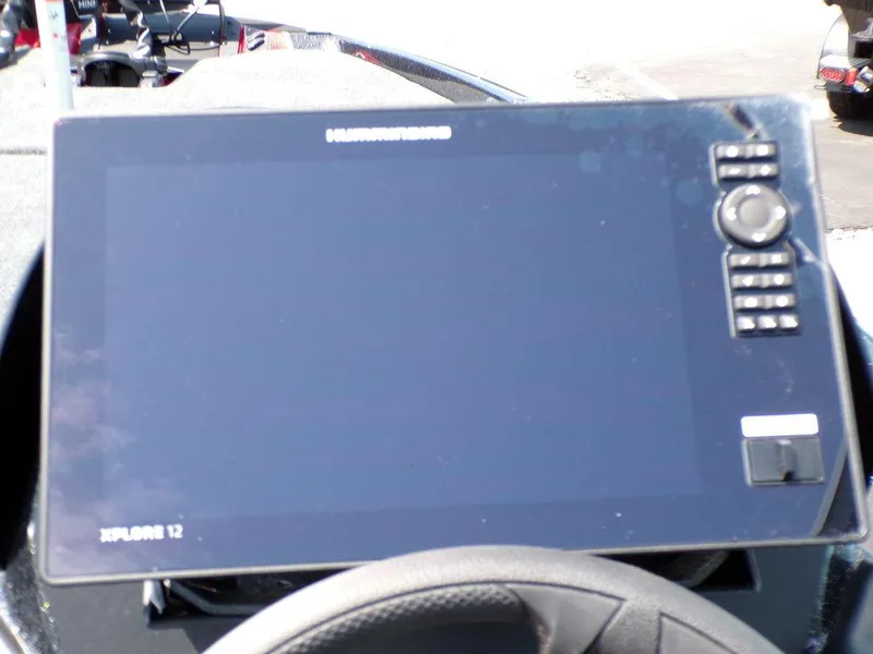 Slide: The Image of Dashboard of a 2025 Skeeter ZXR19 boat featuring a large touchscreen display. - 8