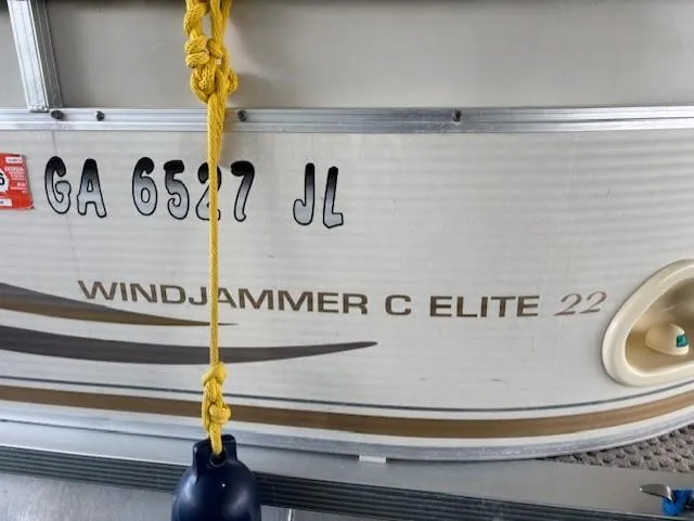 Slide: The Image of 2007 Avalon Windjammer RC 22' boat with registration GA 6527 JL. - 2