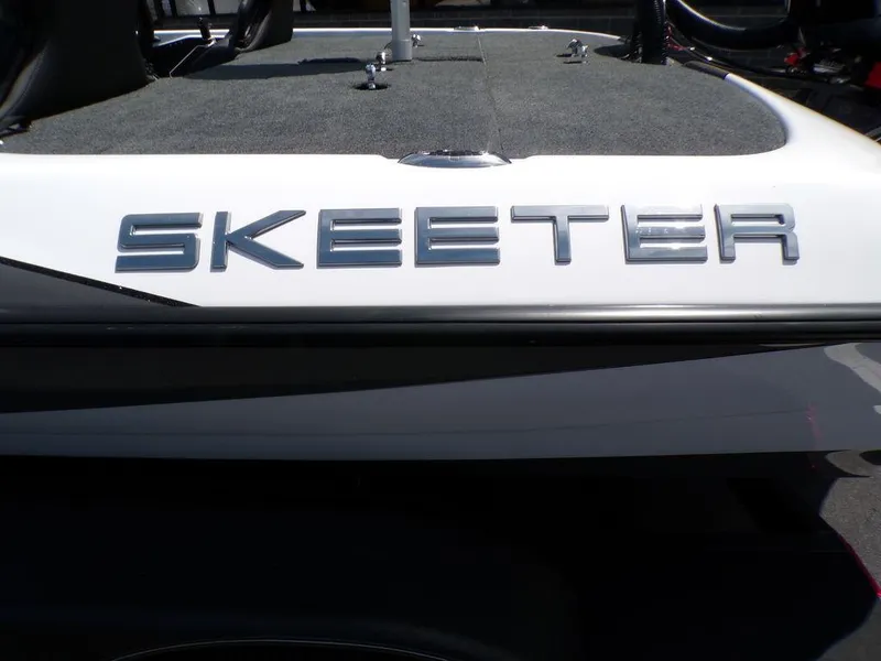 Slide: The Image of 2025 Skeeter ZXR19 boat with sleek design and logo detail. - 19