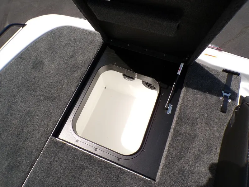 Slide: The Image of Open storage compartment on 2025 Skeeter ZXR19 boat deck. - 3