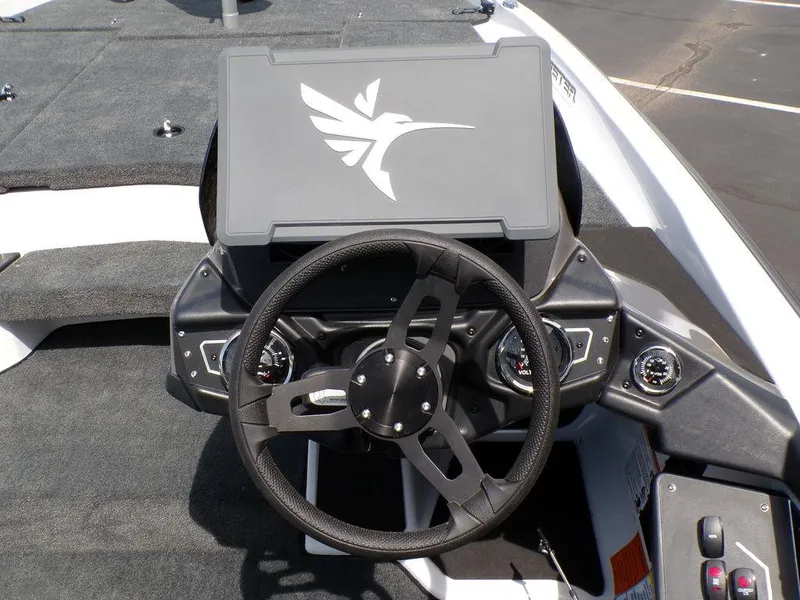 Slide: The Image of Steering console of 2025 Skeeter ZXR19 boat with modern design and logo. - 6