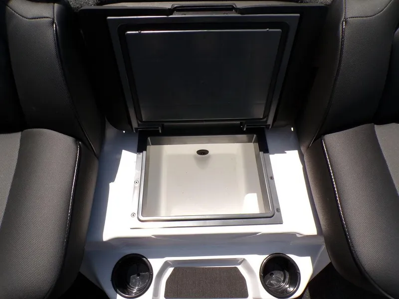Slide: The Image of Interior of 2025 Skeeter ZXR19 boat with open storage compartment. - 7