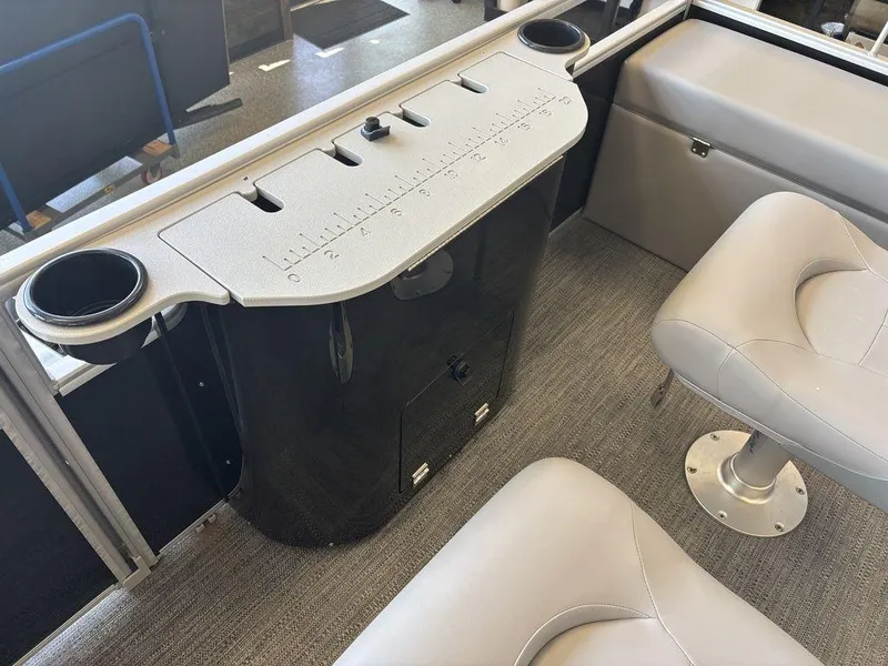 Slide: The Image of Interior of 2025 Godfrey Xperience 1886 FX boat with seating and cup holders. - 17