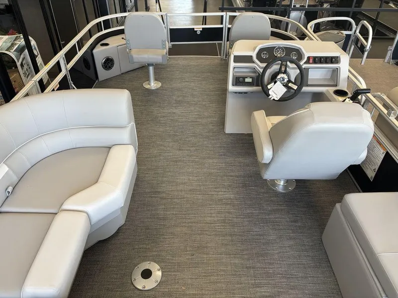 Slide: The Image of 2025 Godfrey Xperience 1886 FX boat interior with modern seating and steering console. - 20