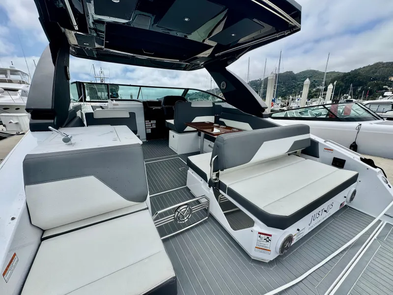 Slide: The Image of 2023 Cruisers Yachts 34 GLS I/O luxury boat interior with sleek seating and modern design. - 18