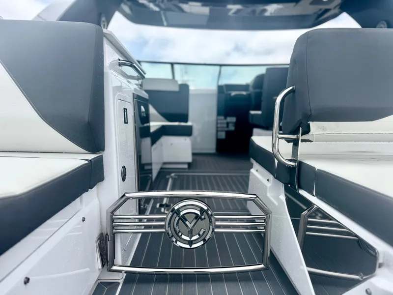 Slide: The Image of 2023 Cruisers Yachts 34 GLS I/O interior with sleek seating and modern design. - 15