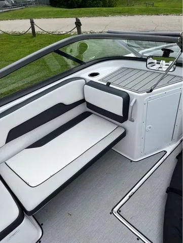 Slide: The Image of 2021 Yamaha AR195 boat with passengers enjoying a sunny day on the water. - 7