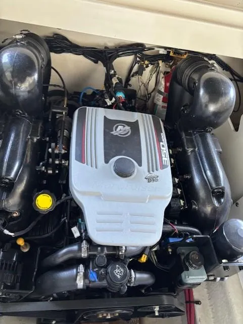 Slide: The Image of 2010 Sea Ray 260 Sundeck engine, showcasing detailed components and layout. - 22