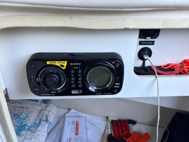 Slide: The Image of Sony stereo system on 2010 Sea Ray 260 Sundeck boat dashboard with USB/iPod connectivity. - 8