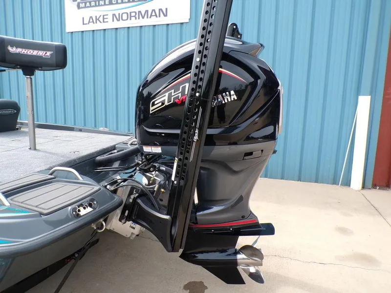 Slide: The Image of 2025 Phoenix 721 ZXL boat with Yamaha engine at Lake Norman Marine Center. - 11