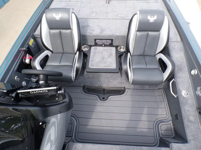 Slide: The Image of 2025 Phoenix 721 ZXL boat interior with dual seats and Garmin equipment. - 14