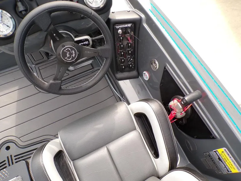 Slide: The Image of 2025 Phoenix 721 ZXL boat interior with steering wheel and control panel. - 3