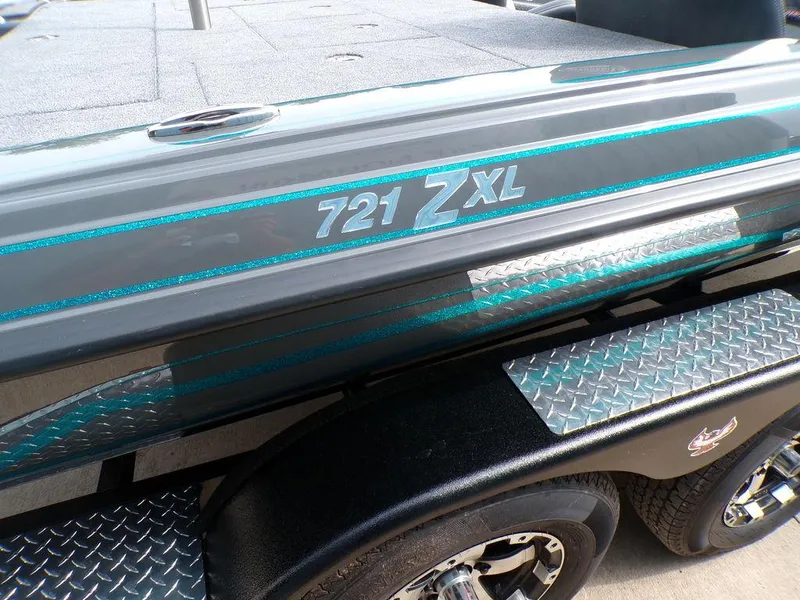 Slide: The Image of 2025 Phoenix 721 ZXL boat with metallic accents and diamond plate detailing. - 8