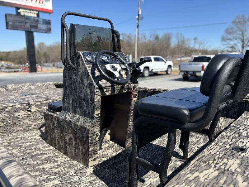 Slide: The Image of Boat interior with steering console and seats, Havoc 1965 UCC model, 2025. - 8