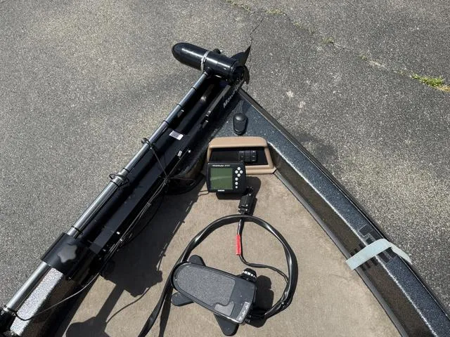 Slide: The Image of Bow of a 2000 Ranger R97 boat with trolling motor and control panel. - 3