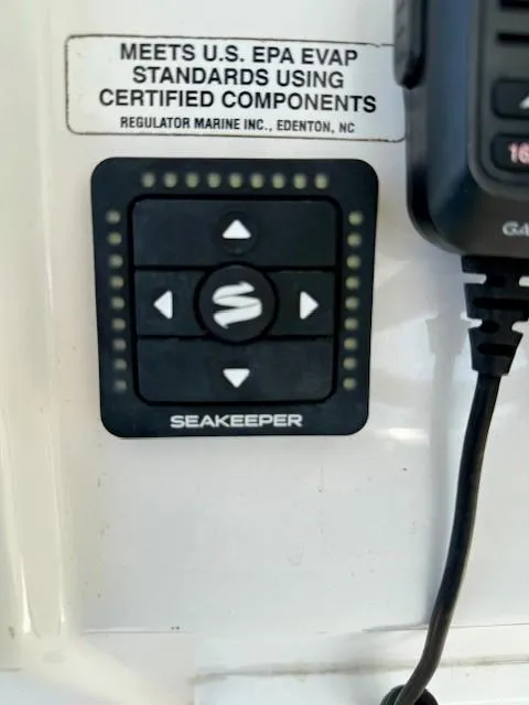 Slide: The Image of Control panel of a 2017 Regulator 31 boat with Seakeeper stabilization system. - 9