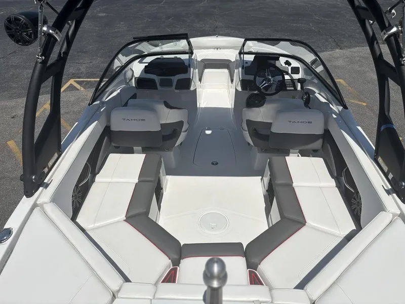 Slide: The Image of 2024 Tahoe 210 S boat interior with spacious seating and modern design. - 10