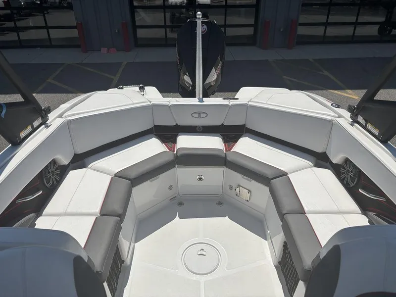 Slide: The Image of 2024 Tahoe 210 S boat interior with spacious seating and modern design. - 11