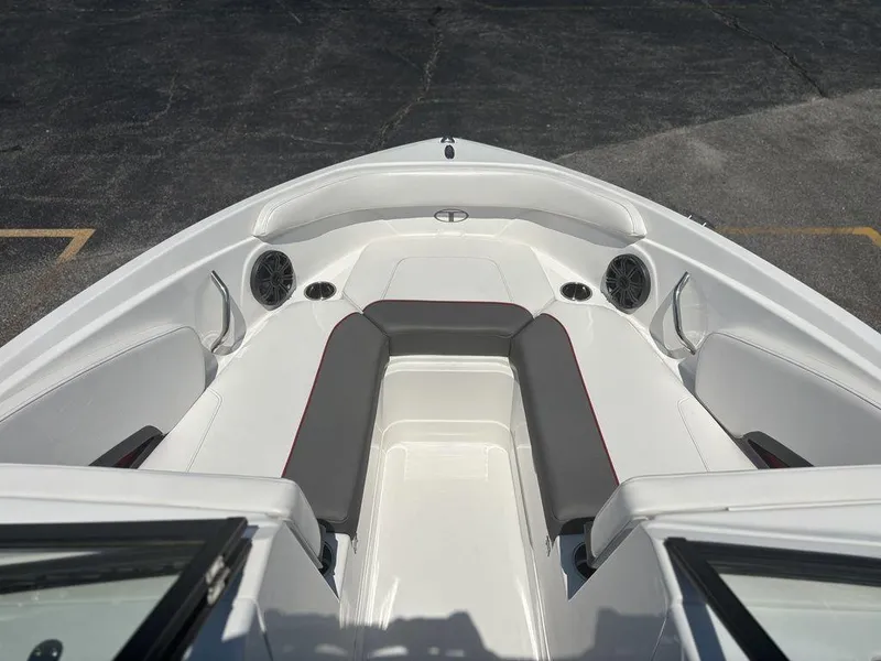 Slide: The Image of 2024 Tahoe 210 S boat interior with seating and speakers. - 16