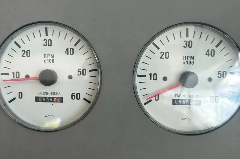 Slide: The Image of Close-up of 1998 Formula 330 SunSport RPM gauges displaying engine hours. - 15
