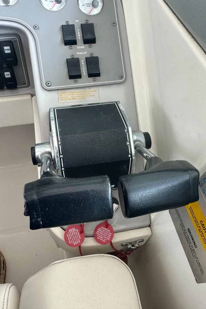 Slide: The Image of 1998 Formula 330 SunSport boat controls and dashboard close-up. - 16