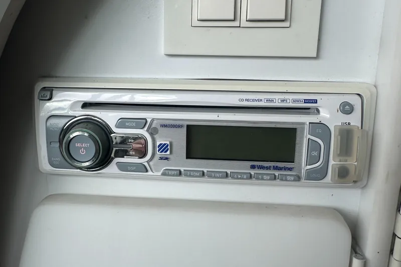 Slide: The Image of 1998 Formula 330 SunSport stereo system with CD player and USB input. - 23