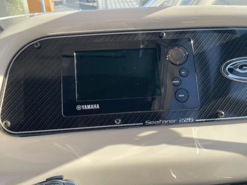 Slide: The Image of Dashboard of 2015 Grady-White Seafarer 226 with Yamaha display. - 11