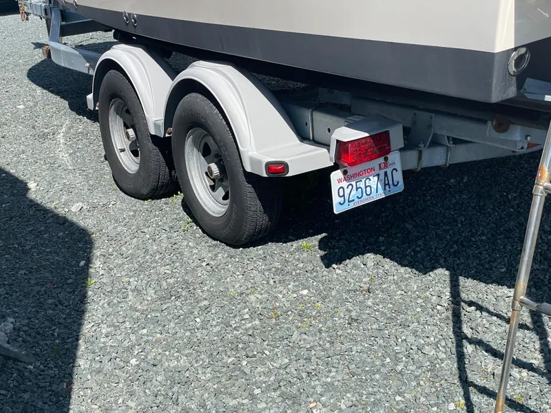 Slide: The Image of Trailer of 2015 Grady-White Seafarer 226 boat with Washington license plate. - 28
