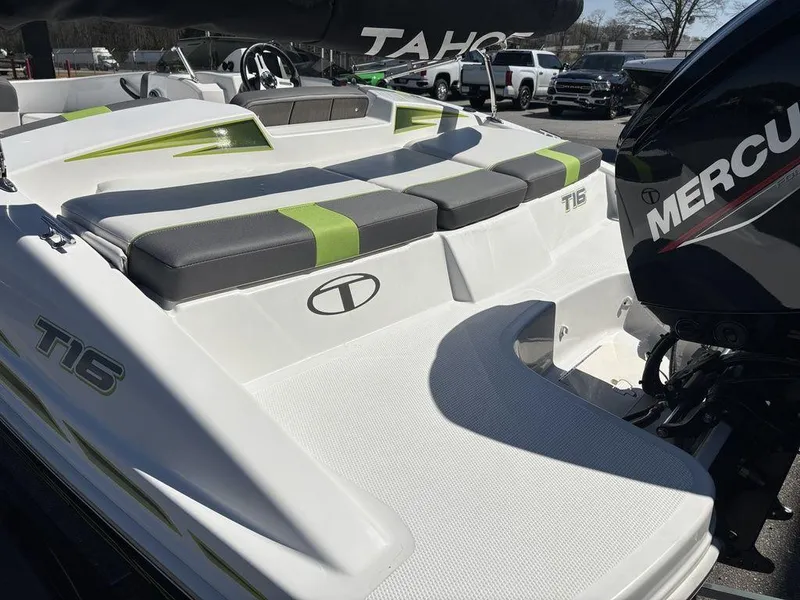 Slide: The Image of 2024 Tahoe T16 boat with Mercury engine, featuring sleek design and comfortable seating. - 14